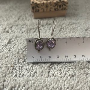 Amethyst earrings. Stamped with 925 in the back. Not sure if previously worn.